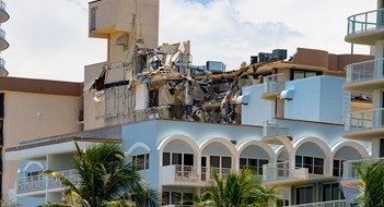 Surfside, FL, USA - July 2, 2021: Debris remains at Champlain Towers Surfside Condominium after collapse