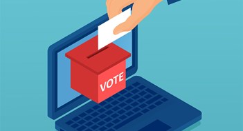 Vector of a hand putting paper with vote in the ballot box in a laptop computer