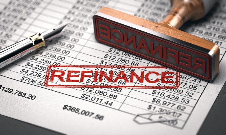 3D illustration of a rubber stamp with the word refinance over a mortgage lender rate sheet. Debt consolidation and debt or loan refinancing concept.
