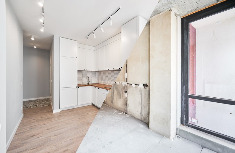 Photo collage of apartment before and after restoration or refurbishment. Comparison of old room and new kitchen with parquet floor, doorway, kitchen counter and white walls. Home renovation concept.