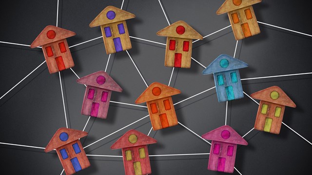 Homeowner Association concept with wooden residential homes models and text