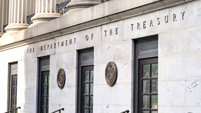 Washington DC, USA - 2 May 2024: Front exterior view of the entrance to the Department of the Treasury building in Washington DC