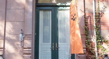 Exterior Repair & Maintenance in Historic Buildings HOBOKEN, NEW JERSEY - October 27, 2017: The beautiful brownstones along Garden Street are decorated for Halloween