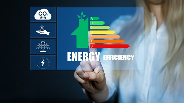 Efficiency energy rating concept. Ecological house with low consumption on renovation with insulation.Sustainable  development and eco house