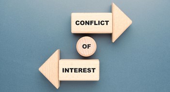 Q&A: Legal Restrictions Concept of conflict of interest,  represented by arrows pointing in different directions