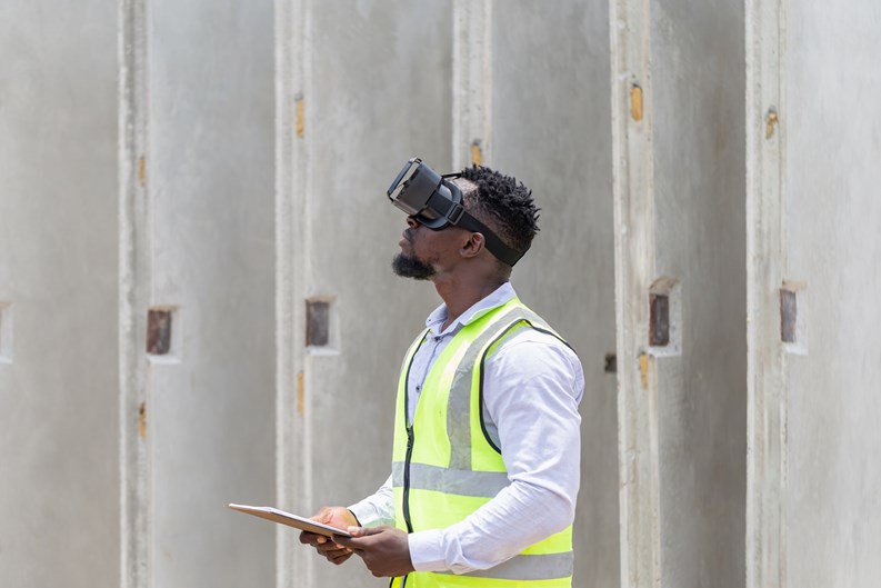 Engineer man with virtual reality glasses at construction site, Construction workers at work
