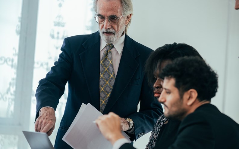 Teamwork meetings, tablets, and business people in the office workplace. Collaboration, technology and workers, men or employees with touchscreen planning sales, company research.